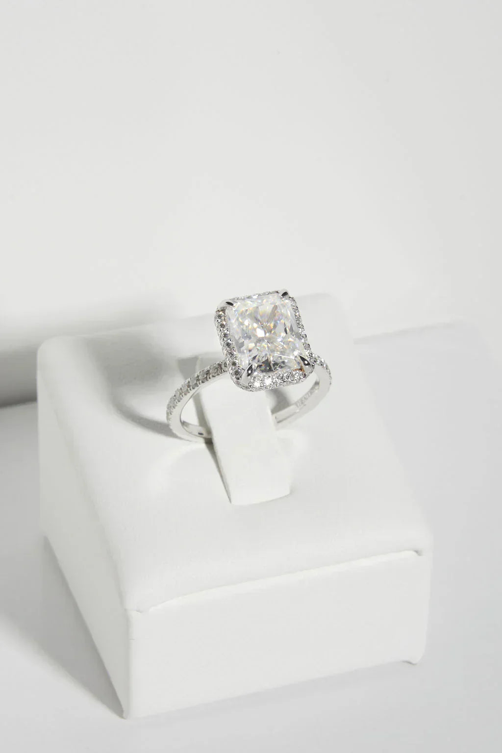 Elegant silver anniversary ring with diamond centerpiece