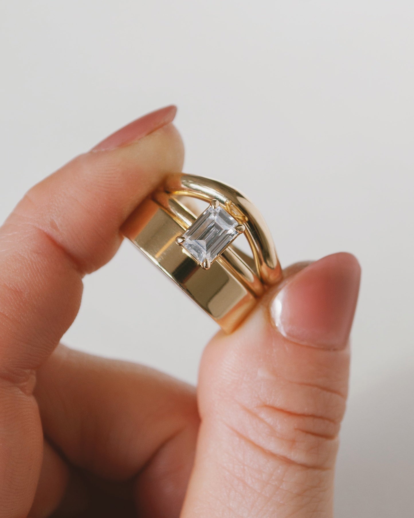Emerald Cut Moissanite Solitaire Ring 14k Rose Gold With Model