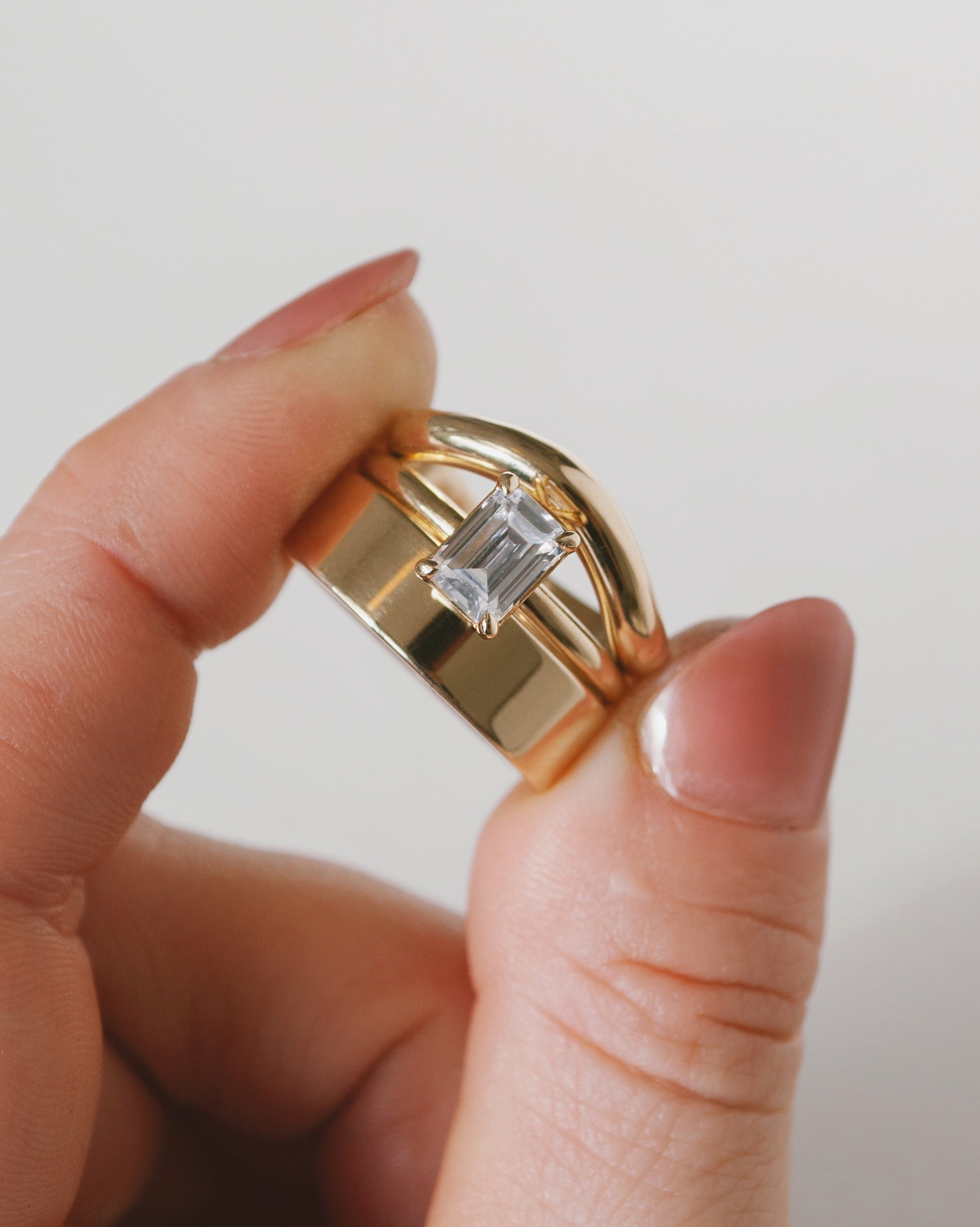 Emerald Cut Moissanite Solitaire Ring 14k Rose Gold With Model