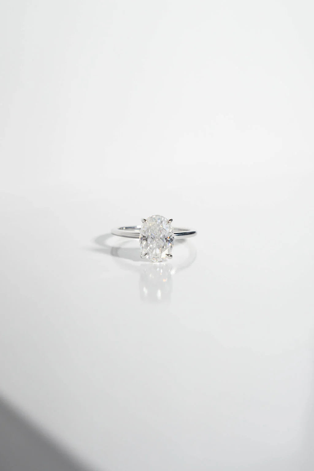 Modern Solitaire Oval Moissanite Gold Engagement Ring