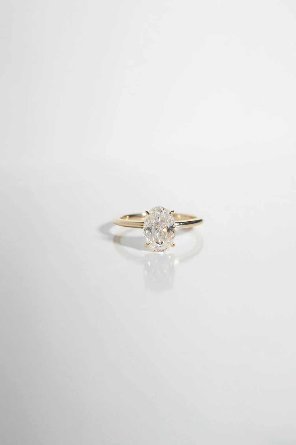 Modern Solitaire Oval Moissanite Gold Engagement Ring