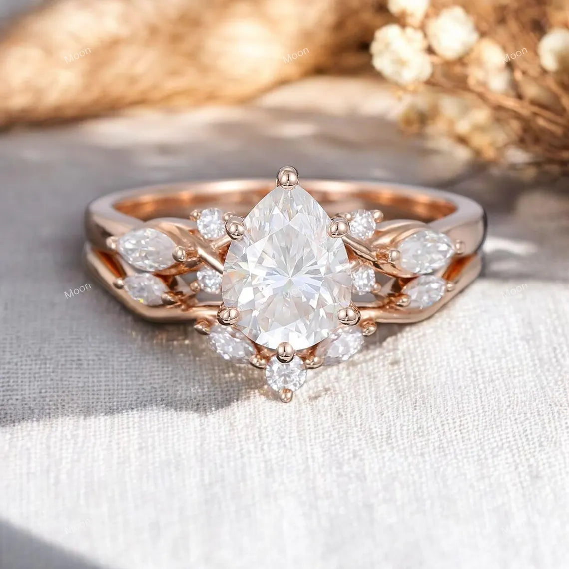 Pear shaped Moissanite engagement ring