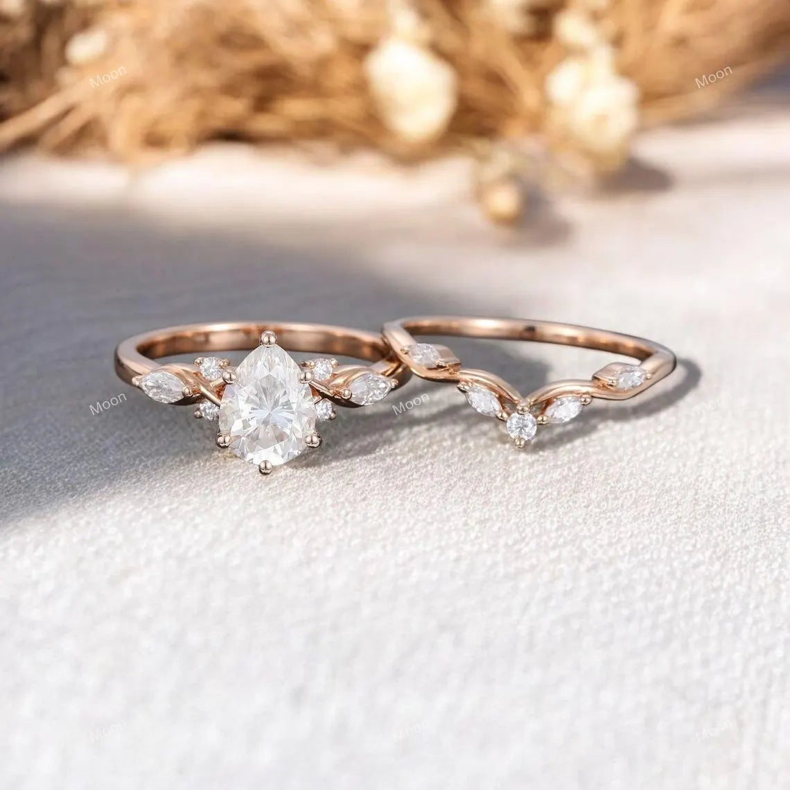 Pear shaped Moissanite engagement ring