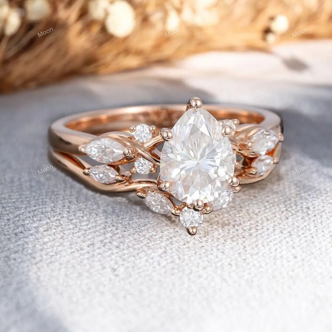 Pear shaped Moissanite engagement ring