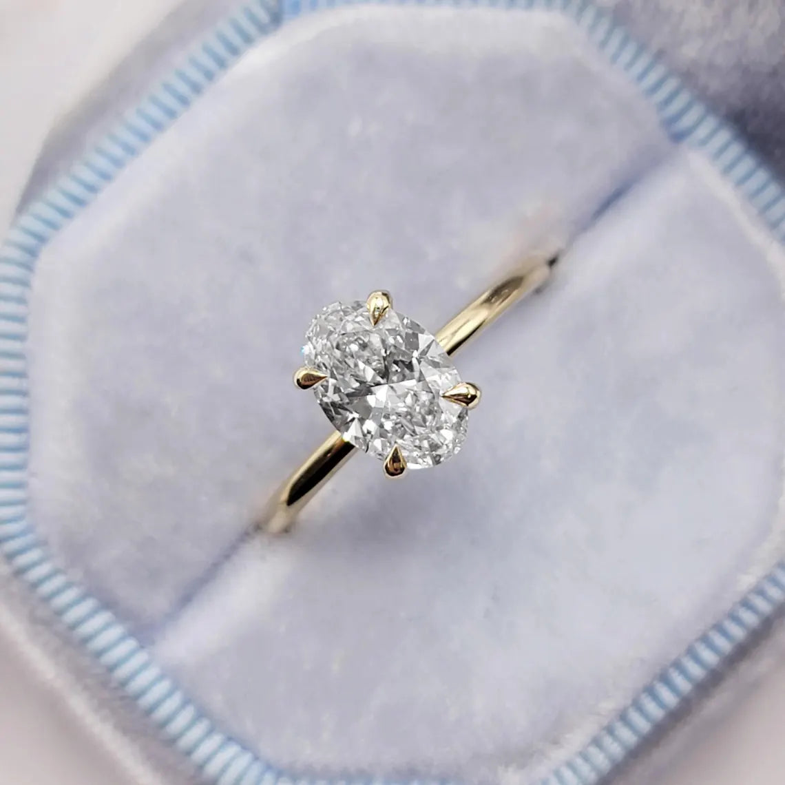Oval Cut Hidden Halo Engagement Ring