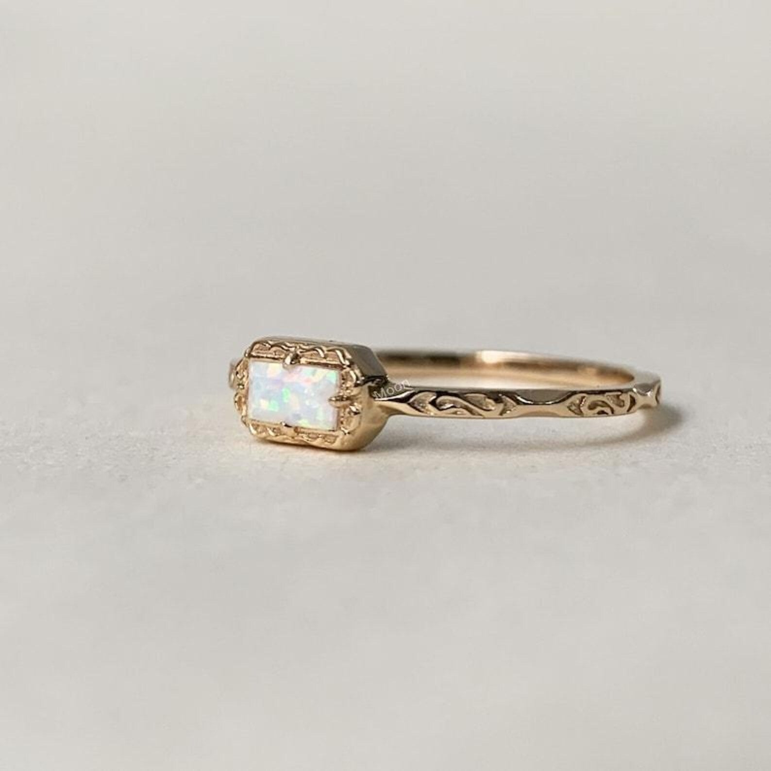 Dainty Opal Baguette Ring Left Angle
