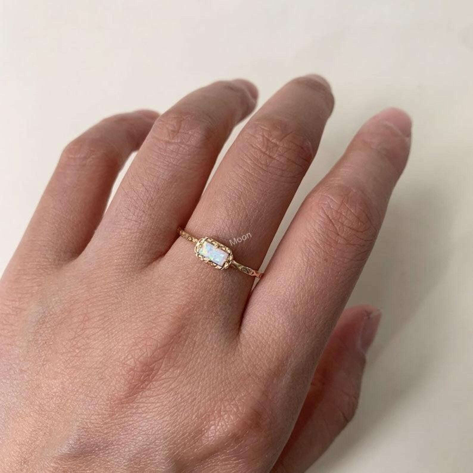 Dainty Opal Baguette Ring in Model Finger