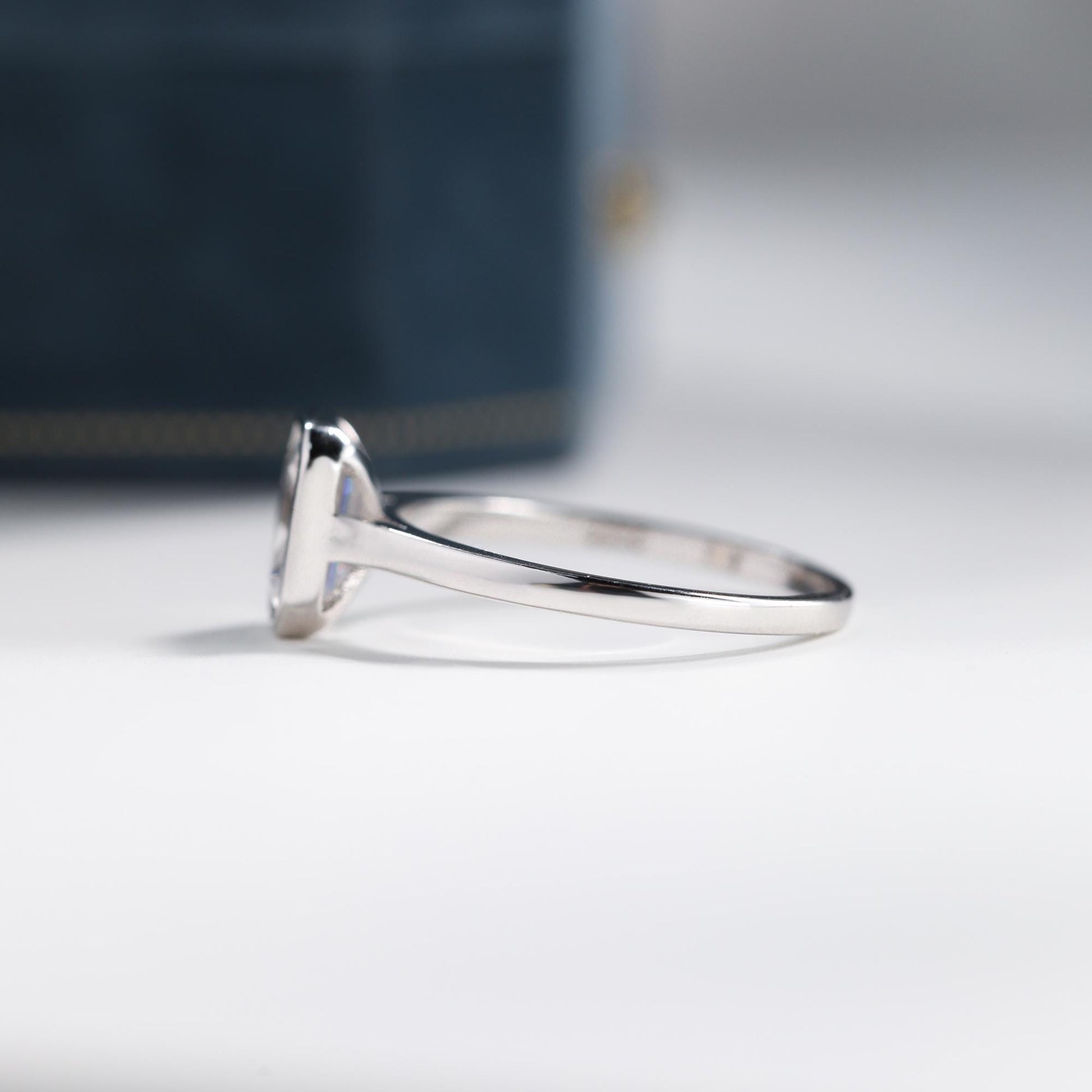 Emerald Cut Moissanite Bezel Sterling Silver Ring SIde View