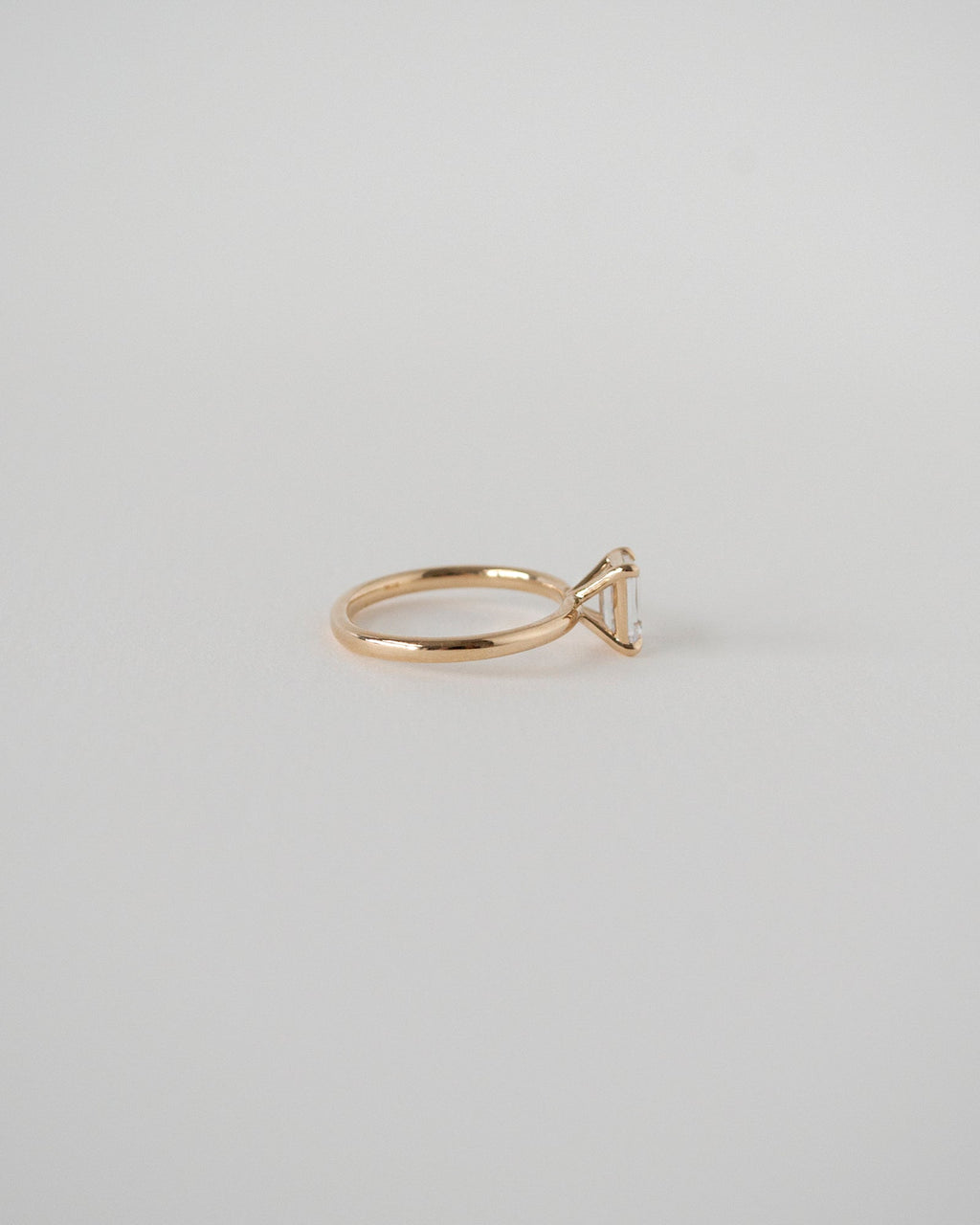 Emerald Cut Moissanite Solitaire Ring 14k Rose Gold Side View