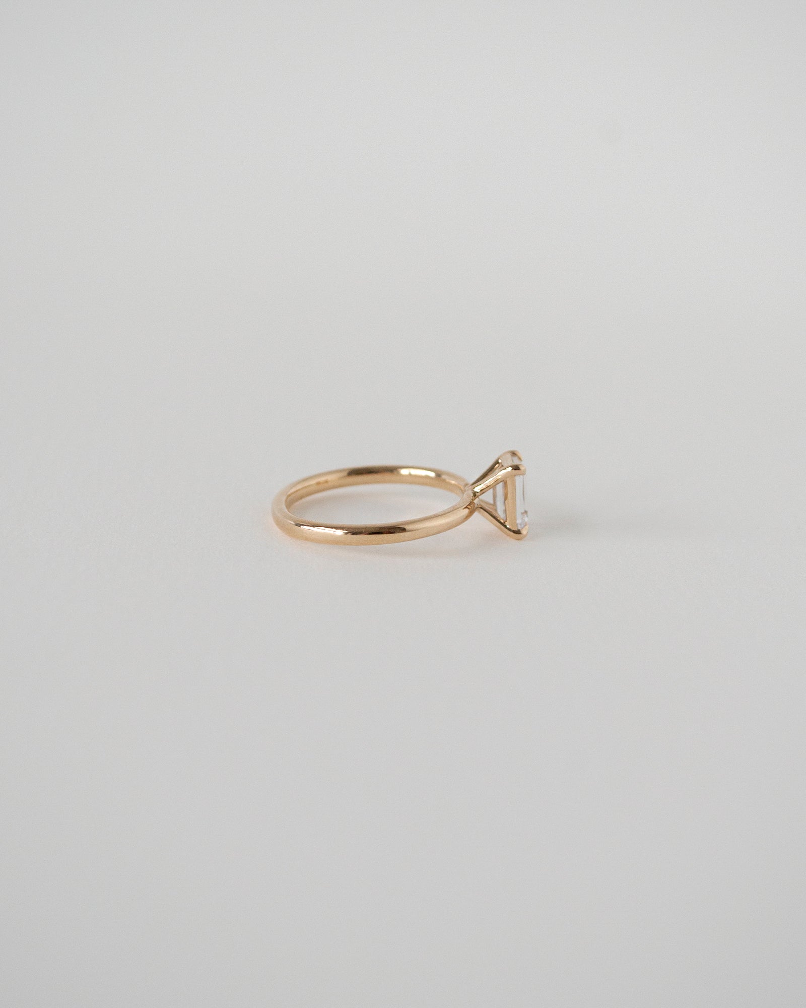 Emerald Cut Moissanite Solitaire Ring 14k Rose Gold Side View