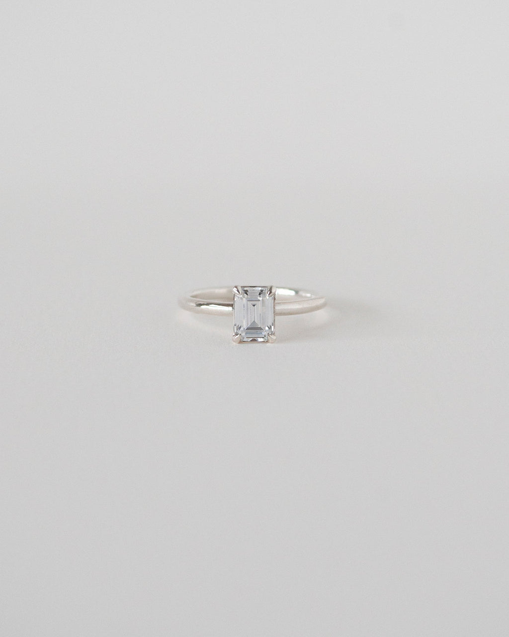 Emerald Cut Moissanite Solitaire Ring 14k Rose Sliver Front View