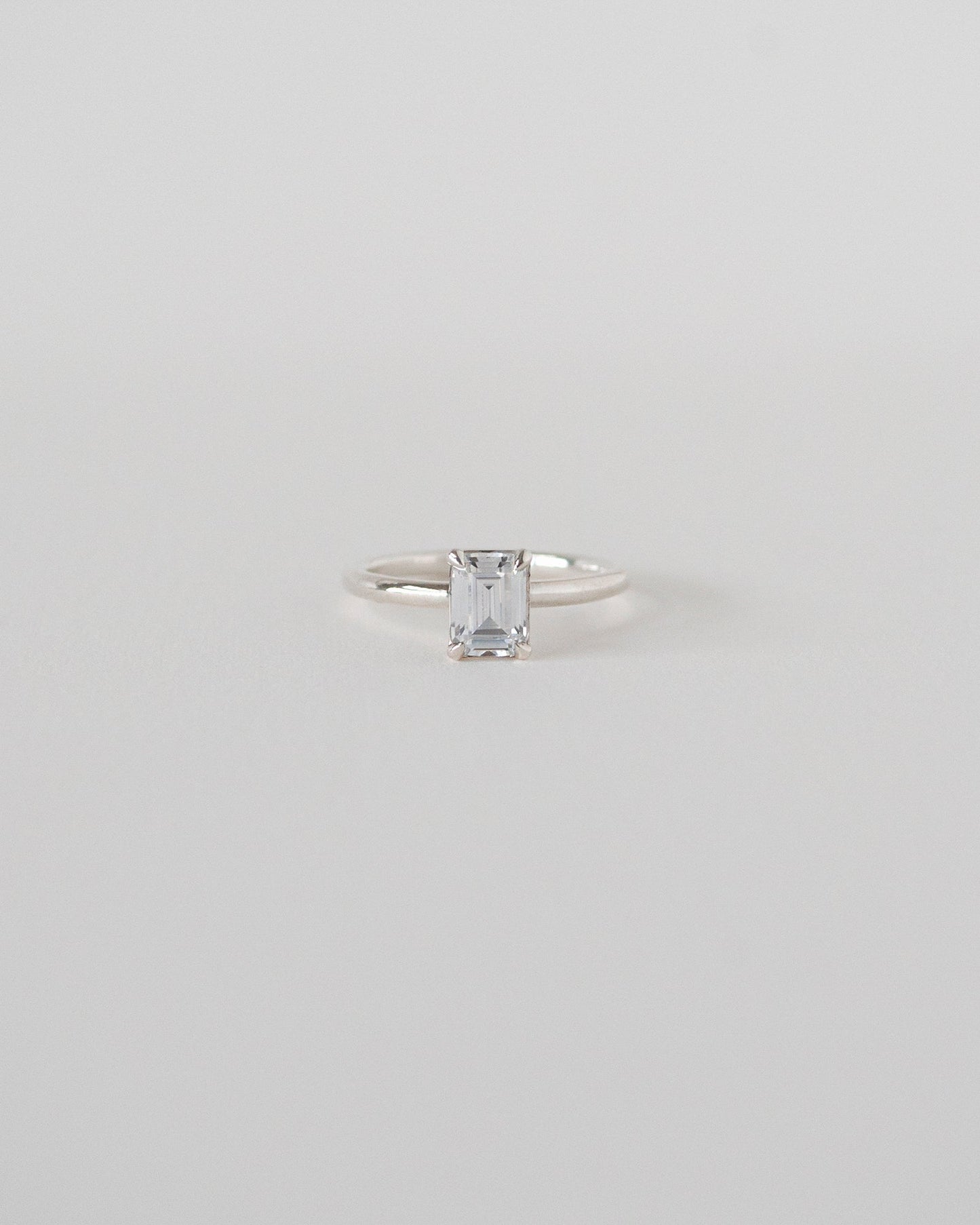 Emerald Cut Moissanite Solitaire Ring 14k Rose Sliver Front View