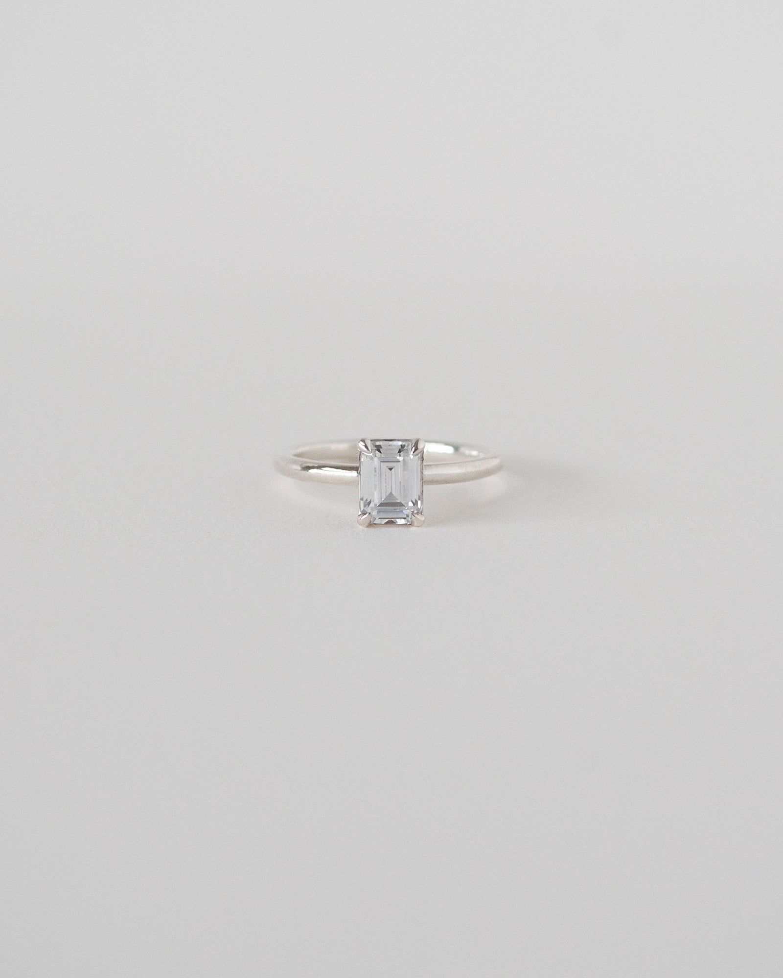 Emerald Cut Moissanite Solitaire Ring 14k Rose Sliver Front View
